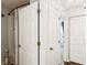 Bright bathroom featuring a shower with a curtain, and white interior doors at 1050 22Nd N Ave, St Petersburg, FL 33704