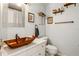 Bathroom with a modern copper sink, vanity and decor at 1050 22Nd N Ave, St Petersburg, FL 33704