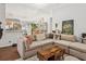 Comfortable living room with a large sectional sofa and view of the dining area at 1050 22Nd N Ave, St Petersburg, FL 33704