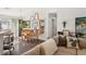 Bright living room with an adjacent dining area and sliding glass doors letting in sunlight at 1050 22Nd N Ave, St Petersburg, FL 33704
