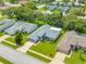 Charming single Gathering home featuring a well-manicured lawn, mature trees and a cozy front porch, perfect for relaxing at 11218 Sun Tree Rd, Hudson, FL 34667