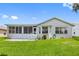 This home has a well-maintained backyard and screened in porch perfect for outdoor enjoyment and entertaining at 11218 Sun Tree Rd, Hudson, FL 34667