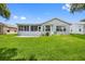 This home has a well-maintained backyard and screened in porch perfect for outdoor enjoyment and entertaining at 11218 Sun Tree Rd, Hudson, FL 34667
