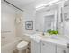 Bright bathroom with essential fixtures, neutral color palette, and a clean design at 11218 Sun Tree Rd, Hudson, FL 34667