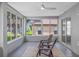 Enjoy the view from this screened lanai, perfect for relaxing outdoors at 11218 Sun Tree Rd, Hudson, FL 34667