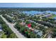 Aerial view of neighborhood near lake, showing the home with a red location pin at 11932 Whisper Creek Dr, Riverview, FL 33569