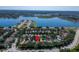 Aerial view of neighborhood near multiple lakes, showing the home with a red location pin at 11932 Whisper Creek Dr, Riverview, FL 33569