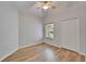 Bedroom featuring wood floors and a closet for storage at 11932 Whisper Creek Dr, Riverview, FL 33569