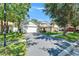 Attractive home with a wide driveway, lush green lawn, and inviting curb appeal at 11932 Whisper Creek Dr, Riverview, FL 33569