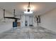 Spacious two-car garage with ample storage space and overhead shelving at 11932 Whisper Creek Dr, Riverview, FL 33569