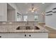 The kitchen sink is in an open floor plan, with great countertop space at 11932 Whisper Creek Dr, Riverview, FL 33569