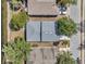 Aerial view of the house shows the roof, the surrounding area, and the driveway at 12351 Ridgedale Dr, Hudson, FL 34669
