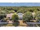 Aerial view of the house shows the roof and the surrounding yards and houses at 12351 Ridgedale Dr, Hudson, FL 34669