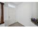 Inviting entryway with tile flooring and a decorative pillar at 12351 Ridgedale Dr, Hudson, FL 34669