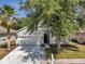 Charming one-story home with a two car garage and landscaped front yard at 12351 Ridgedale Dr, Hudson, FL 34669