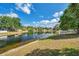 The backyard features an expansive view of the lake at 12351 Ridgedale Dr, Hudson, FL 34669
