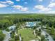 Beautiful aerial view of the community amenities, including the pool, clubhouse, and green spaces at 17537 Brighton Lake Rd, Land O Lakes, FL 34638