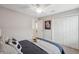 Bright bedroom with plush carpets, ceiling fan, and large closet at 17537 Brighton Lake Rd, Land O Lakes, FL 34638