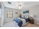 Cozy bedroom with a comfortable bed, soft lighting, and stylish decor at 17537 Brighton Lake Rd, Land O Lakes, FL 34638
