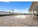 Spacious community pool area with ample deck space, modern amenities, and beautifully maintained landscaping at 17537 Brighton Lake Rd, Land O Lakes, FL 34638