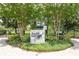 Fenced community dog park with mature landscaping and shade trees at 17537 Brighton Lake Rd, Land O Lakes, FL 34638