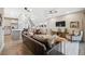 Open-concept living room adjoining kitchen and dining area with modern finishes at 17537 Brighton Lake Rd, Land O Lakes, FL 34638