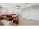 Cozy living room featuring a large sectional sofa and plenty of space for entertaining at 17537 Brighton Lake Rd, Land O Lakes, FL 34638