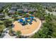 Aerial view of playground with slides and swings provides fun for all ages at 17537 Brighton Lake Rd, Land O Lakes, FL 34638