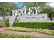 Elegant entrance sign for the Bexley by Newland community, nestled among lush greenery at 18172 Ramble On Way, Land O Lakes, FL 34638