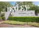 The Bexley by Newland community entrance sign, complemented by manicured landscaping, making an inviting statement at 18172 Ramble On Way, Land O Lakes, FL 34638