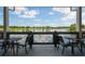 Enjoy a view of the lake from this covered seating area at 18172 Ramble On Way, Land O Lakes, FL 34638