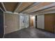 Enclosed patio featuring tile flooring and access to a storage area at 1883 Clearbrooke Dr, Clearwater, FL 33760