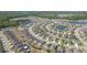 Expansive aerial shot of a thriving neighborhood boasting lush landscaping, serene ponds, and modern residences at 19032 Malinche Loop, Spring Hill, FL 34610