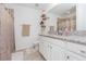Bathroom with double vanity, granite countertop, and shower-tub combo at 19032 Malinche Loop, Spring Hill, FL 34610