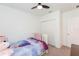 Bedroom featuring a bed next to a closet, creating an organized and efficient space at 19032 Malinche Loop, Spring Hill, FL 34610