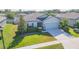 Charming single-Gathering home with well-maintained landscaping, a two-car garage, and inviting curb appeal at 19032 Malinche Loop, Spring Hill, FL 34610