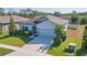 Attractive single-Gathering home with a two-car garage, landscaped yard, and well-kept exterior at 19032 Malinche Loop, Spring Hill, FL 34610