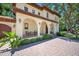 Inviting front porch with comfortable seating and lush landscaping, perfect for relaxing outdoors at 1966 Freedom Dr, Clearwater, FL 33755