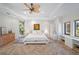 Bright main bedroom with private balcony and ample windows at 1966 Freedom Dr, Clearwater, FL 33755