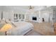 Bright main bedroom with ample windows and built in storage at 1966 Freedom Dr, Clearwater, FL 33755