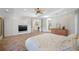 Bright main bedroom with built-in storage and ensuite bathroom at 1966 Freedom Dr, Clearwater, FL 33755