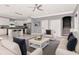 Open-concept living space with neutral tones, modern finishes, and a staircase visible in the background at 212 W Floribraska Ave, Tampa, FL 33603