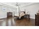 Spacious bedroom with hardwood floors, neutral walls, and large windows at 2604 S Bryant Cir, Tampa, FL 33629