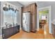 Kitchen featuring stainless steel refrigerator, wooden cabinets and hardwood floors at 2638 Burlington N Ave, St Petersburg, FL 33713