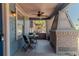 Inviting porch featuring outdoor seating, ceiling fan, and classic architectural details at 2638 Burlington N Ave, St Petersburg, FL 33713
