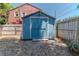 A sturdy blue storage shed provides extra space for tools, equipment, and outdoor essentials at 2638 Burlington N Ave, St Petersburg, FL 33713
