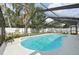 Enjoy this screened-in pool with an updated patio, perfect for outdoor relaxation and entertainment at 3093 Woodpine Cir, Sarasota, FL 34231