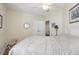 Inviting bedroom with a comfortable bed, bright walls, natural light, and a closet, creating a peaceful retreat at 316 5Th N Ave, Safety Harbor, FL 34695