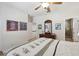 Light and airy bedroom featuring painted walls, stylish decor, and a view of the ensuite at 316 5Th N Ave, Safety Harbor, FL 34695