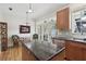Charming kitchen features an island, wood cabinets, and a bright breakfast nook at 316 5Th N Ave, Safety Harbor, FL 34695